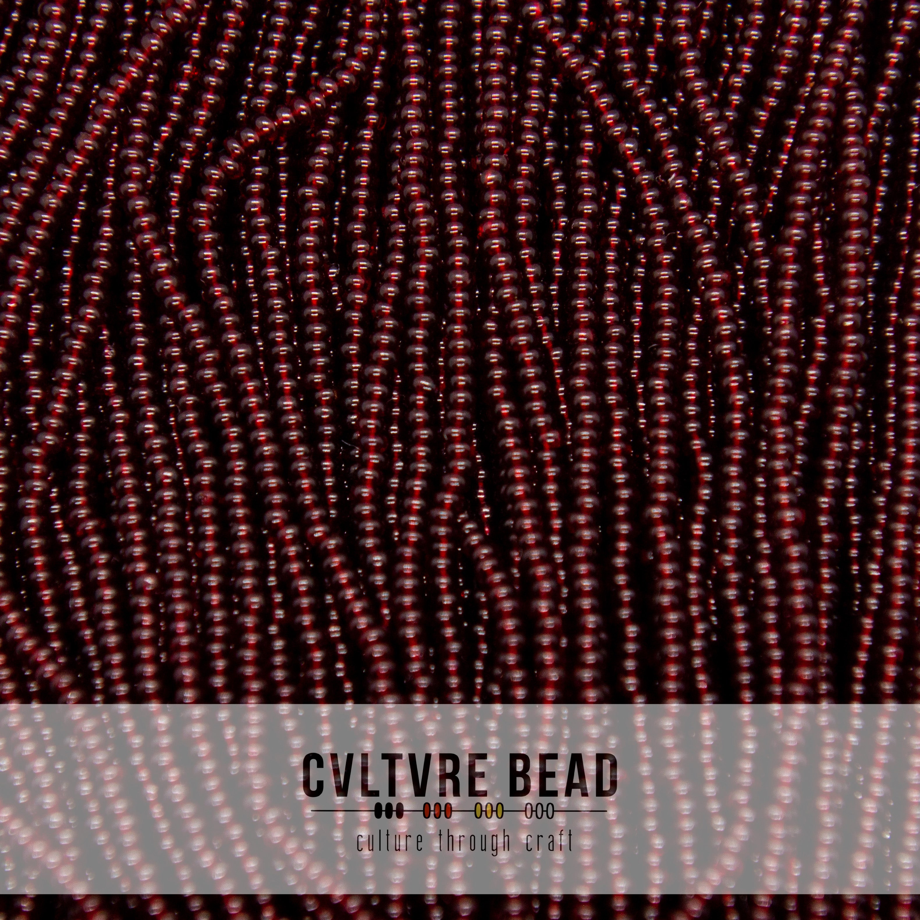Czech Seed Bead 10/0 Garnet Transparent - 1 Hank